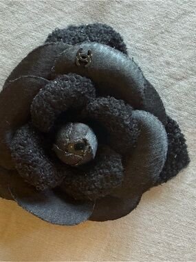 CHANEL Black Camellia Flower Hair Accessory with Logo Accent